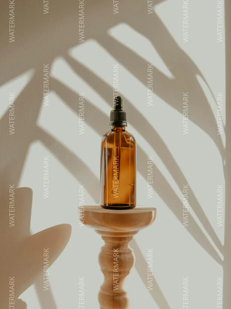 A product image of a brown glass bottle with watermarks